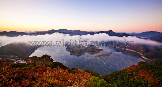 Okjeong Lake in Imsil with morning mist over Bungeo Island