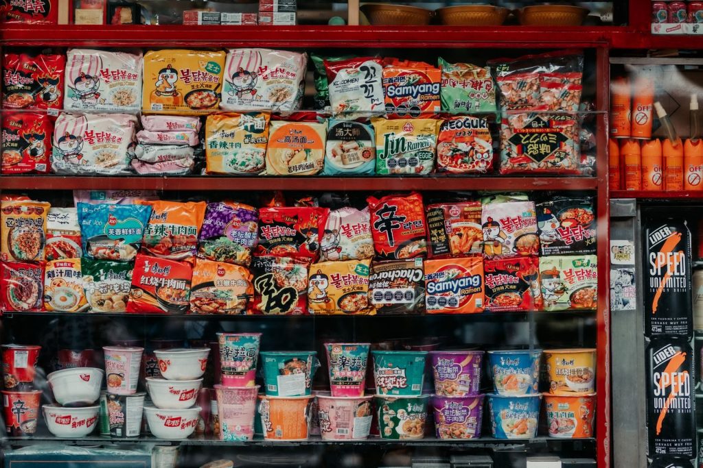 Interior of a small convenience store with stocked shelves