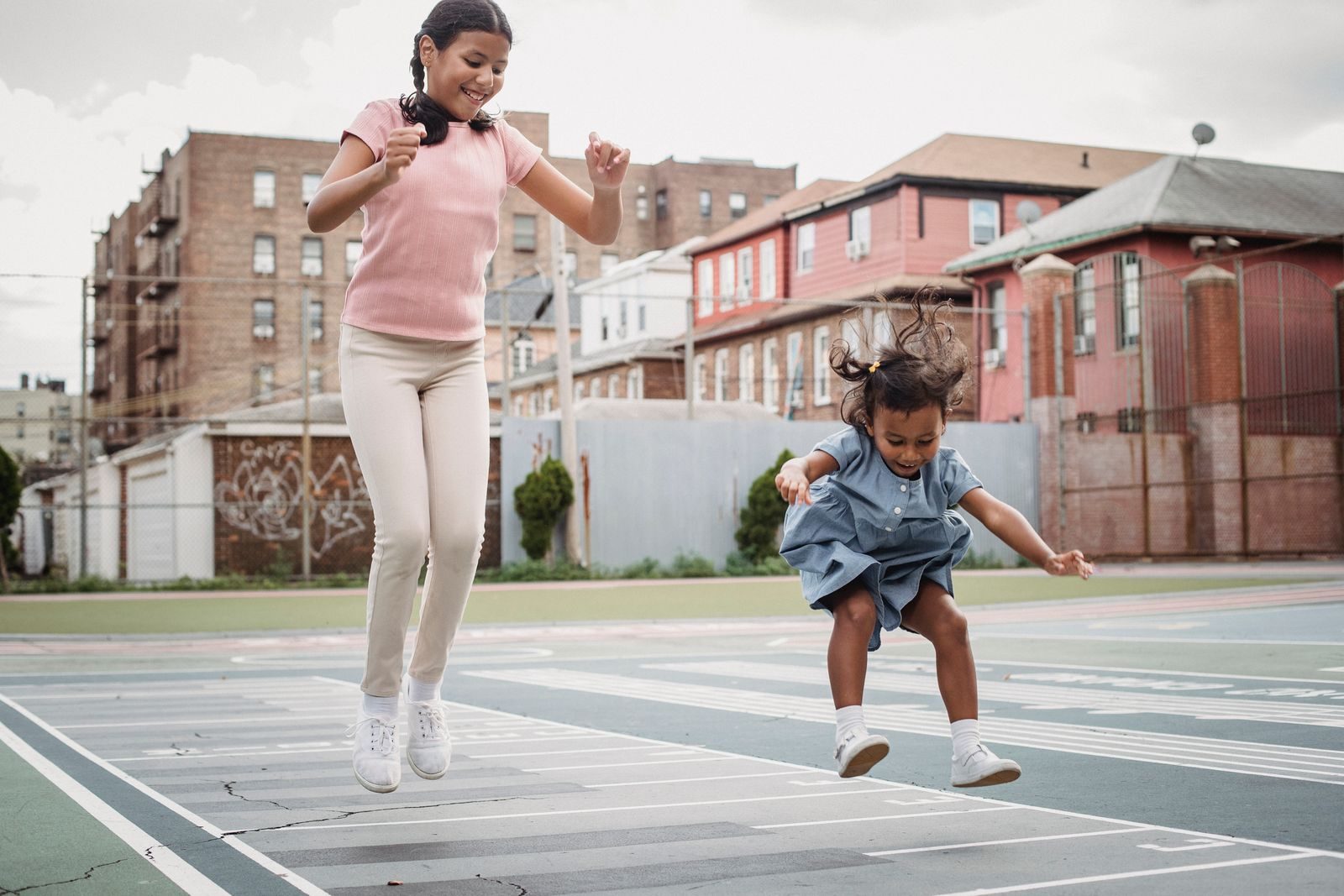 Children playing an outdoor game in a schoolyard
