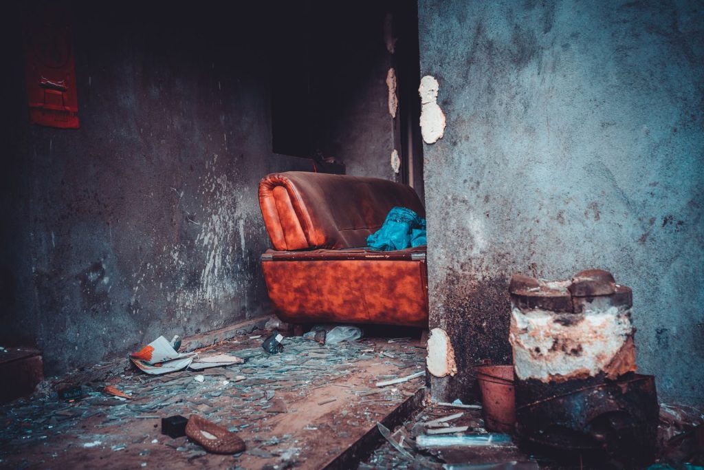 An old sofa left on a residential street in Korea waiting for collection
