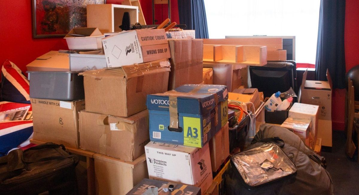 brown cardboard boxes on brown wooden table