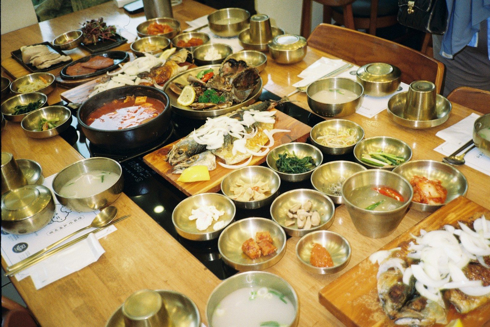 A Korean home meal with rice, stew and side dishes
